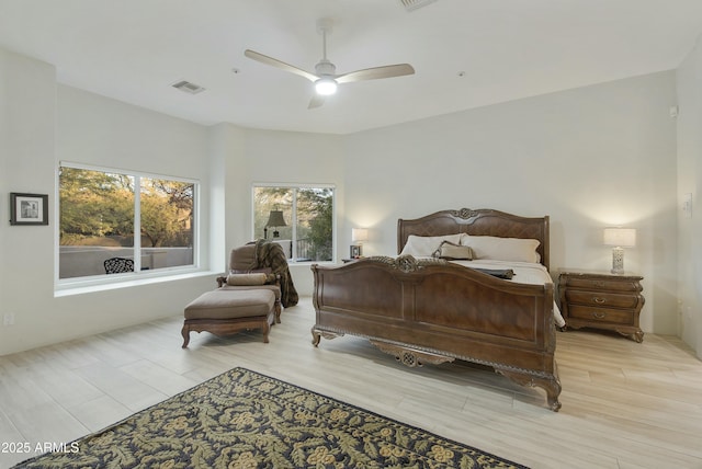 bedroom featuring ceiling fan and light hardwood / wood-style flooring