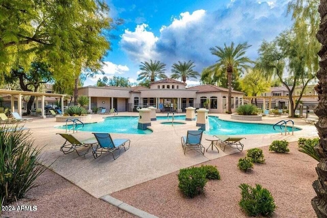 view of pool with a patio area