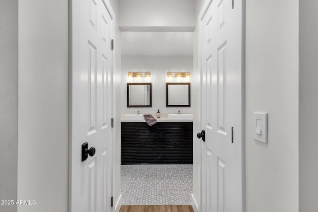 5112 E Cholla St, Scottsdale, AZ 85254 - bathroom featuring wood finished floors and double vanity