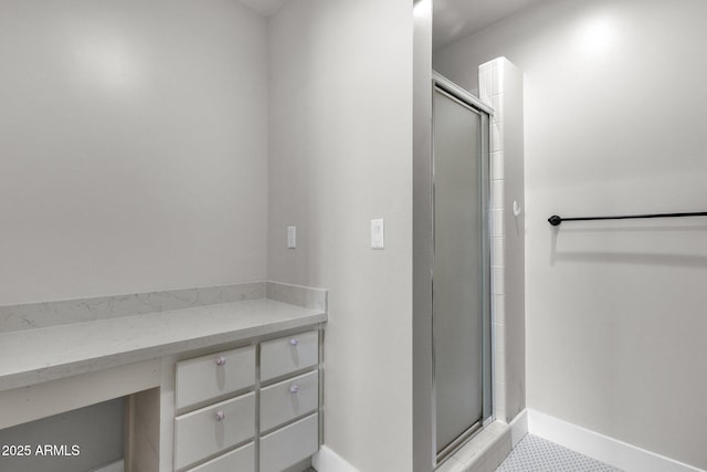 5112 E Cholla St, Scottsdale, AZ 85254 - bathroom featuring a stall shower and baseboards