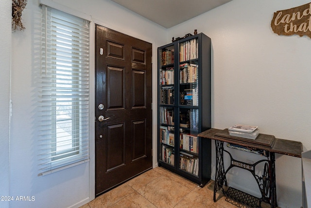 view of tiled foyer entrance