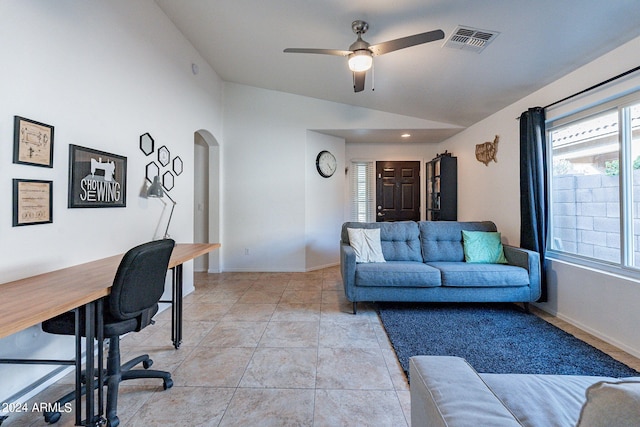 tiled office featuring vaulted ceiling and ceiling fan