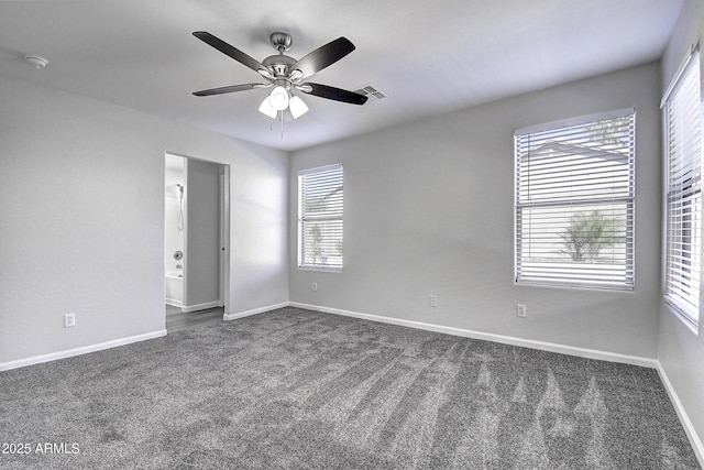 carpeted empty room with ceiling fan