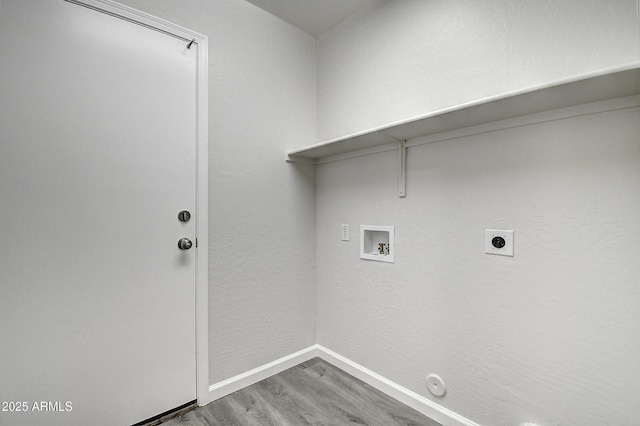 laundry area with electric dryer hookup, hookup for a washing machine, hookup for a gas dryer, and wood-type flooring