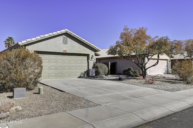 ranch-style home with a garage