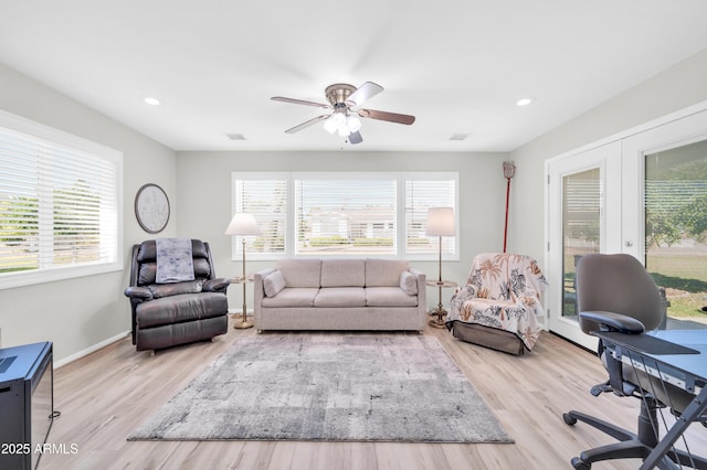 10873 W Clair Dr, Sun City, AZ 85351 - living room with wood finished floors, a ceiling fan, and recessed lighting