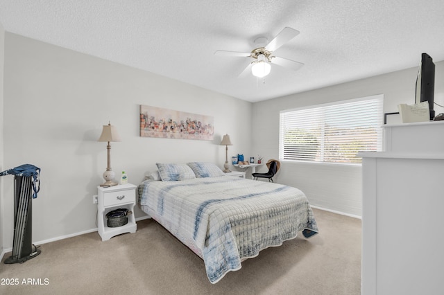 10873 W Clair Dr, Sun City, AZ 85351 - carpeted bedroom featuring a textured ceiling and a ceiling fan