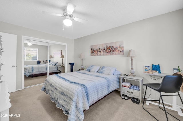 10873 W Clair Dr, Sun City, AZ 85351 - bedroom with carpet, a closet, and a ceiling fan