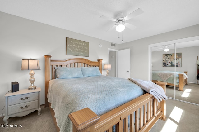 10873 W Clair Dr, Sun City, AZ 85351 - carpeted bedroom with a closet and a ceiling fan