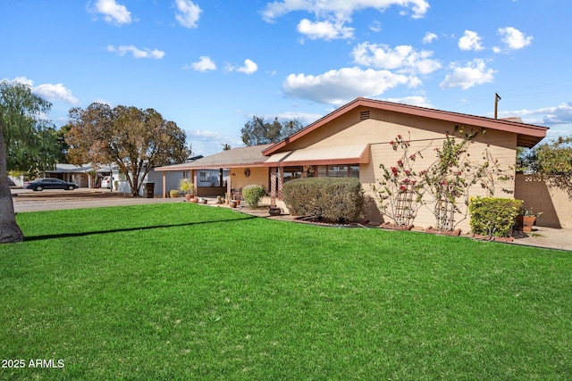 exterior space with a front lawn