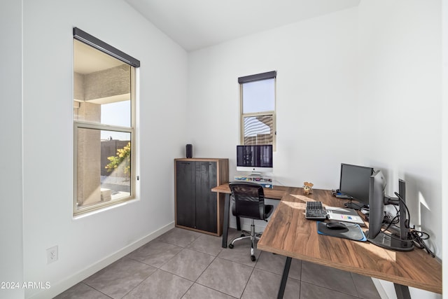 office area featuring light tile patterned floors and a healthy amount of sunlight