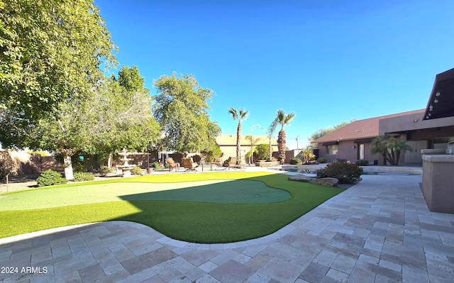 view of community with a patio area