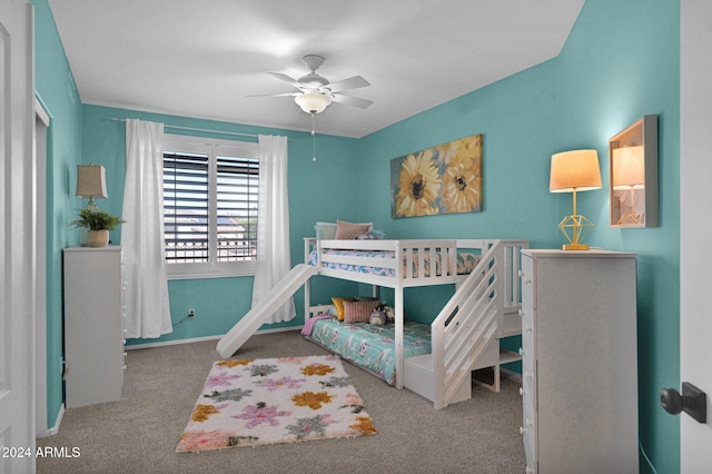 carpeted bedroom with ceiling fan