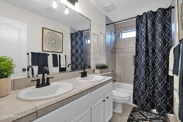 full bathroom with tile patterned floors, vanity, shower / bath combination with curtain, and toilet