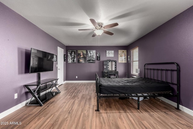 3235 S Bowman Rd, Apache Junction, AZ 85119 - bedroom with wood finished floors, baseboards, and ceiling fan