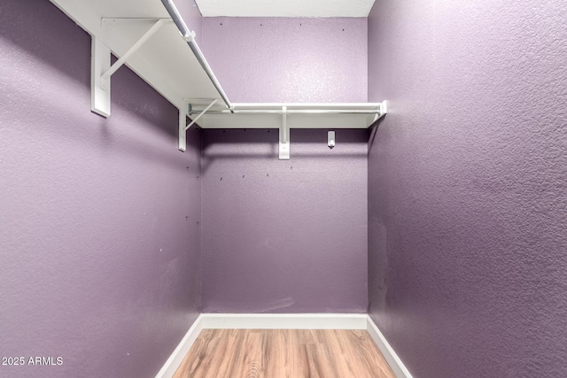 3235 S Bowman Rd, Apache Junction, AZ 85119 - walk in closet featuring wood finished floors