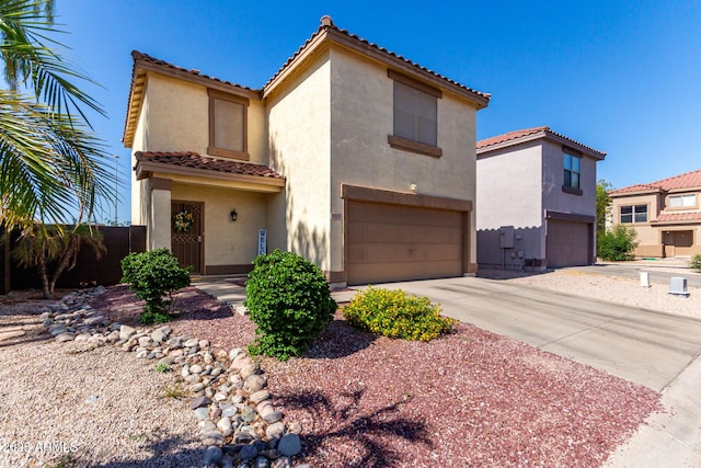 3235 S Bowman Rd, Apache Junction, AZ 85119 - mediterranean / spanish house with a garage, stucco siding, a tiled roof, and driveway
