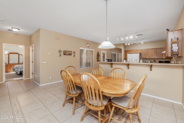 view of tiled dining room