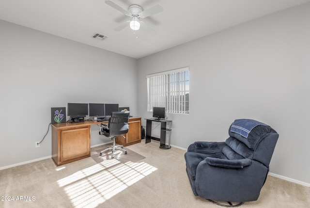 office area with light colored carpet and ceiling fan