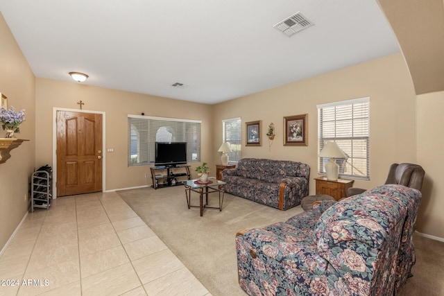 living room with light tile patterned floors