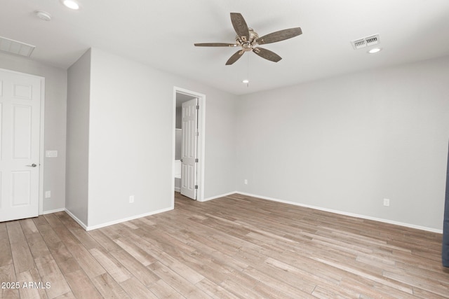 unfurnished room with light hardwood / wood-style flooring and ceiling fan