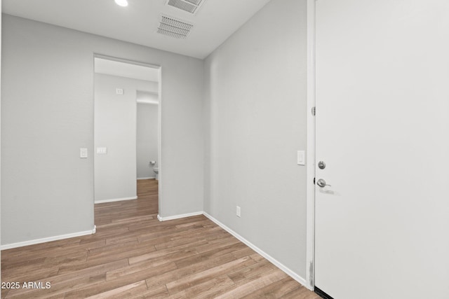 hallway featuring light hardwood / wood-style floors