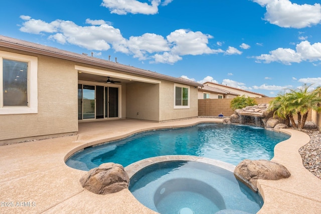 view of pool with an in ground hot tub, ceiling fan, and a patio