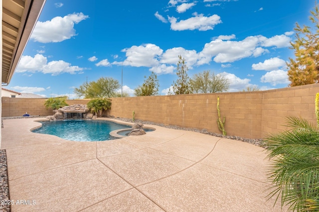 view of swimming pool featuring a patio area and pool water feature