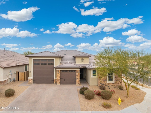 view of front of property featuring a garage