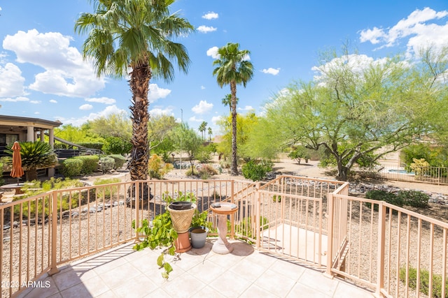 view of patio / terrace with a balcony