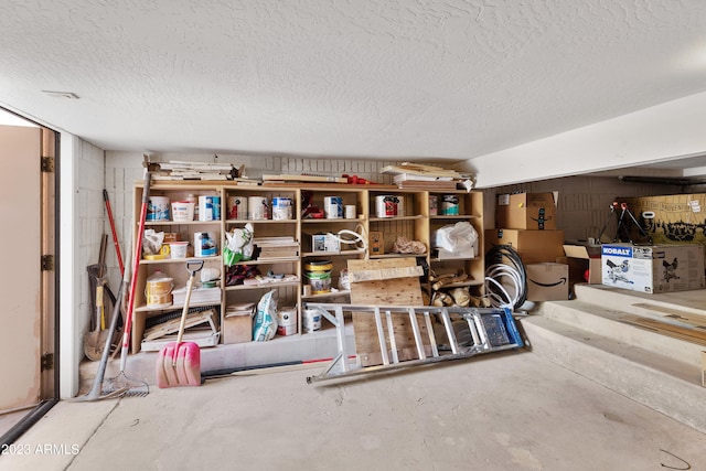 basement featuring a textured ceiling