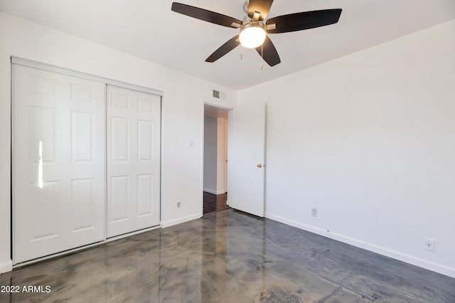 unfurnished bedroom with a closet and ceiling fan