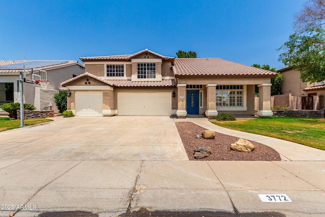 3772 E Leah Ln, Gilbert, AZ 85234 - mediterranean / spanish-style home with stucco siding, a tile roof, concrete driveway, and an attached garage