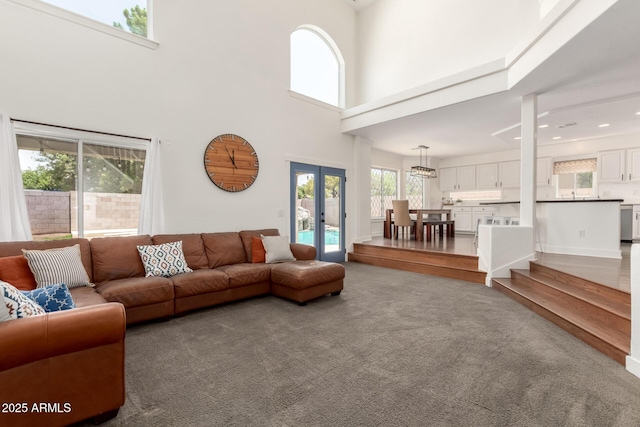 3772 E Leah Ln, Gilbert, AZ 85234 - carpeted living room featuring french doors and a high ceiling