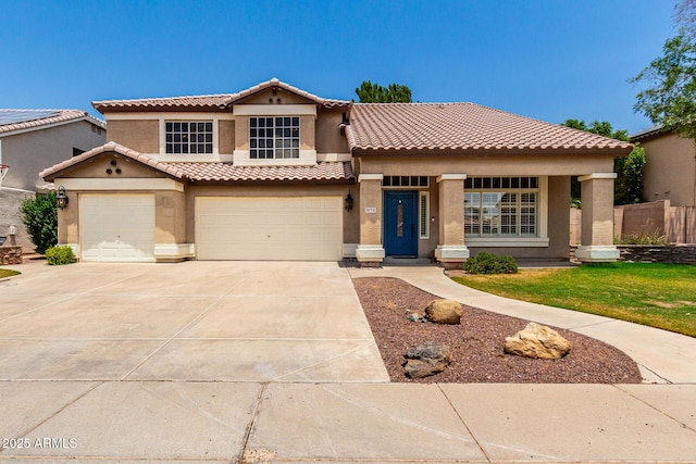 3772 E Leah Ln, Gilbert, AZ 85234 - mediterranean / spanish-style house featuring stucco siding, a tiled roof, driveway, and a garage
