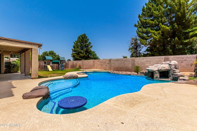 3772 E Leah Ln, Gilbert, AZ 85234 - view of pool with a patio area, a playground, and a fenced backyard