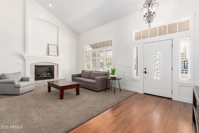 3772 E Leah Ln, Gilbert, AZ 85234 - foyer featuring high vaulted ceiling, hardwood / wood-style flooring, and a fireplace