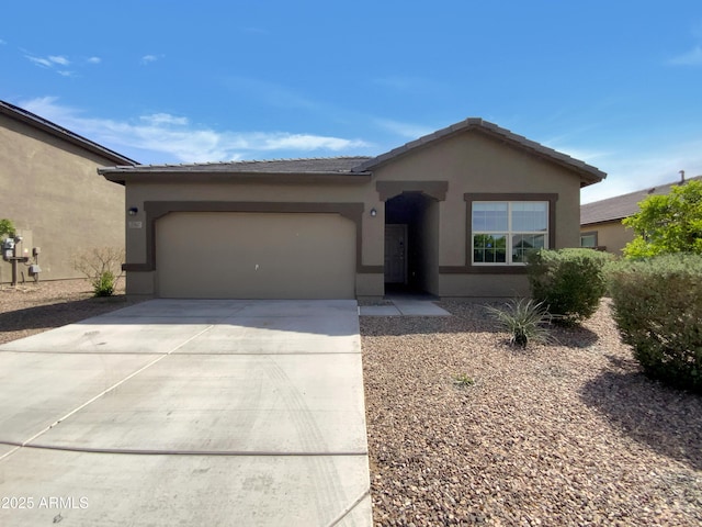 2367 E Rosario Mission Dr, Casa Grande, AZ 85194 - ranch-style house featuring a tile roof, a garage, concrete driveway, and stucco siding