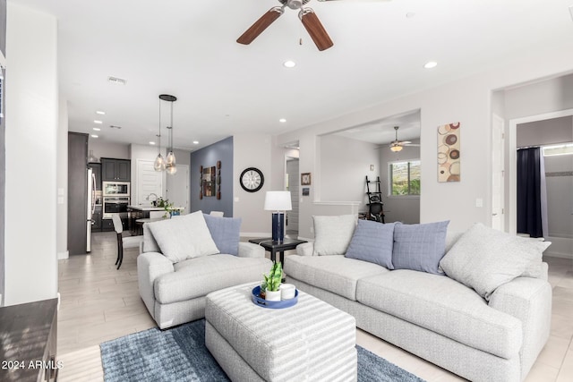 living room featuring ceiling fan