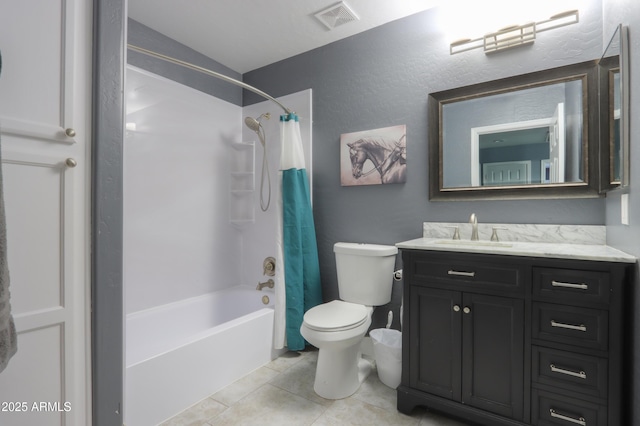 full bathroom featuring tile patterned floors, vanity, toilet, and shower / bath combo