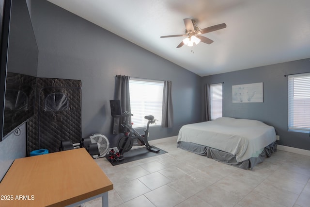 bedroom featuring ceiling fan and vaulted ceiling