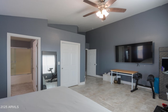 bedroom featuring ensuite bath and ceiling fan