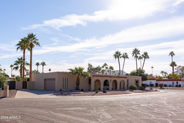 view of front of property featuring a garage