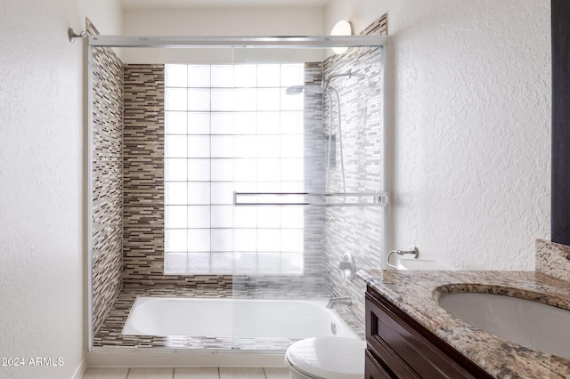 full bathroom featuring vanity, toilet, enclosed tub / shower combo, and a wealth of natural light