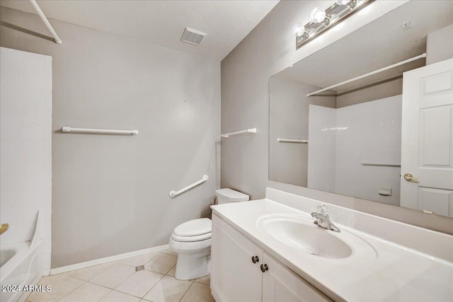 full bathroom with shower / tub combination, a textured ceiling, toilet, vanity, and tile patterned flooring