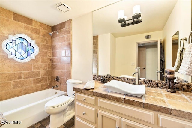 8638 E Paraiso Dr, Scottsdale, AZ 85255 - full bathroom featuring toilet, visible vents, shower / tub combination, and vanity