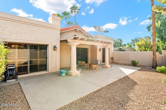 8638 E Paraiso Dr, Scottsdale, AZ 85255 - back of house featuring a chimney, a patio area, fence, a pergola, and stucco siding