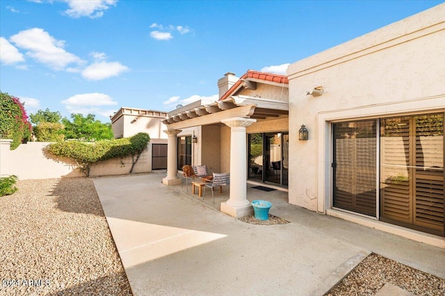 8638 E Paraiso Dr, Scottsdale, AZ 85255 - back of property with a patio, fence, a tile roof, and stucco siding