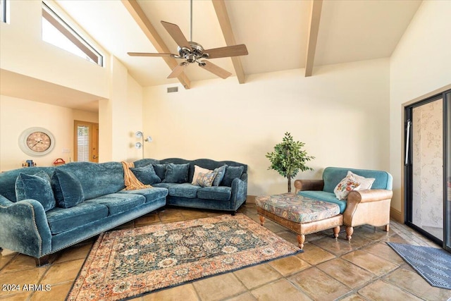 living room featuring beam ceiling, high vaulted ceiling, and ceiling fan