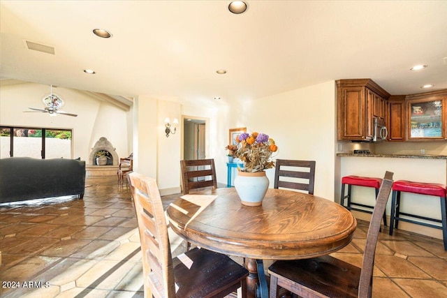 dining space with ceiling fan